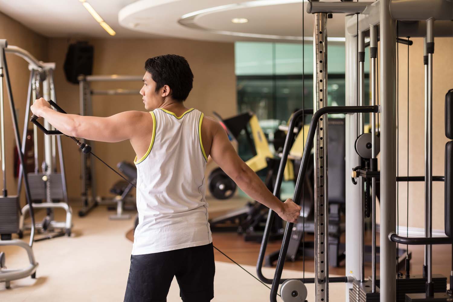 man performing shoulder mobility exercises